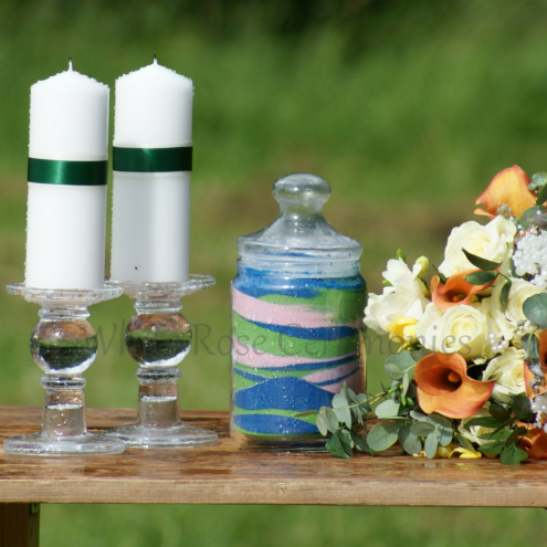 Sand Unity Ceremony jar with candles and flowers