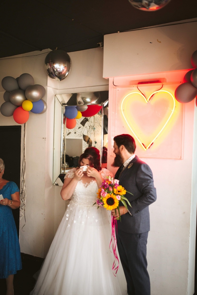 Micro Wedding Bride wipes tears from eyes